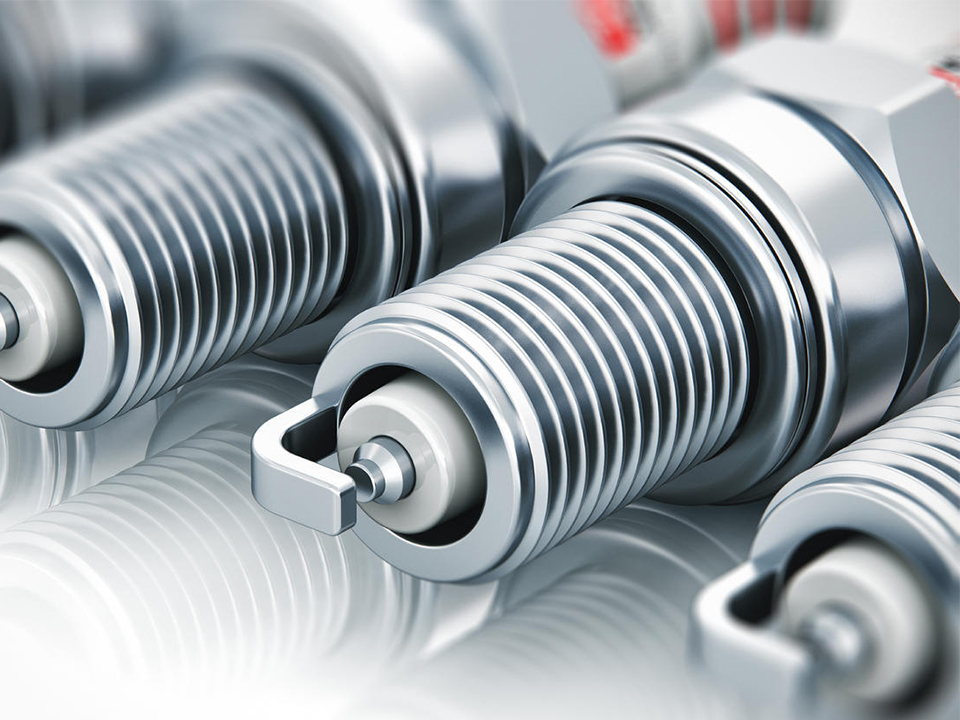 What is the working principle of spark plug?